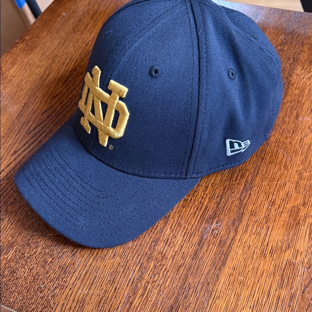New Era Dark Blue Cap with Gold Logo